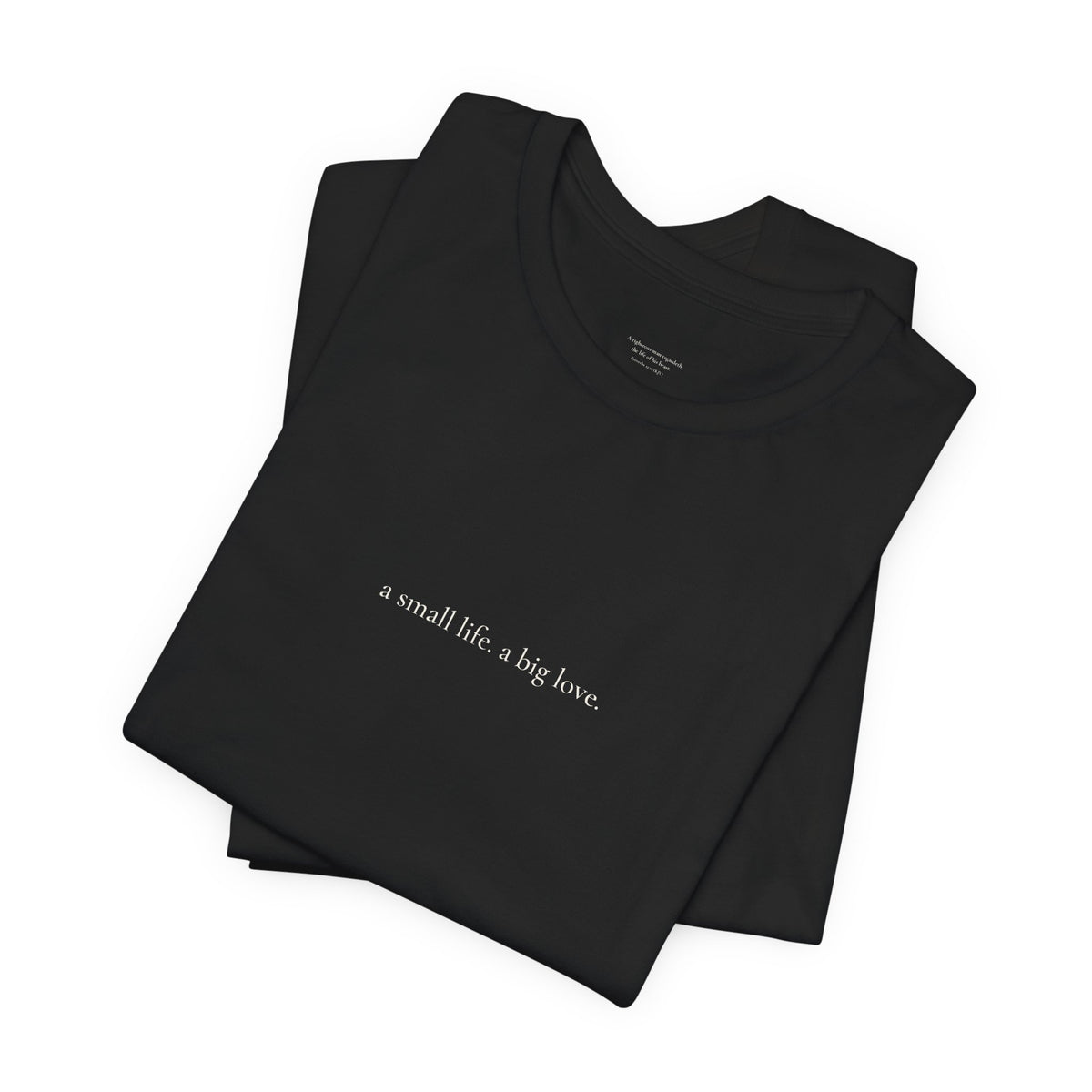 a small life. a big love. tee in Black, folded