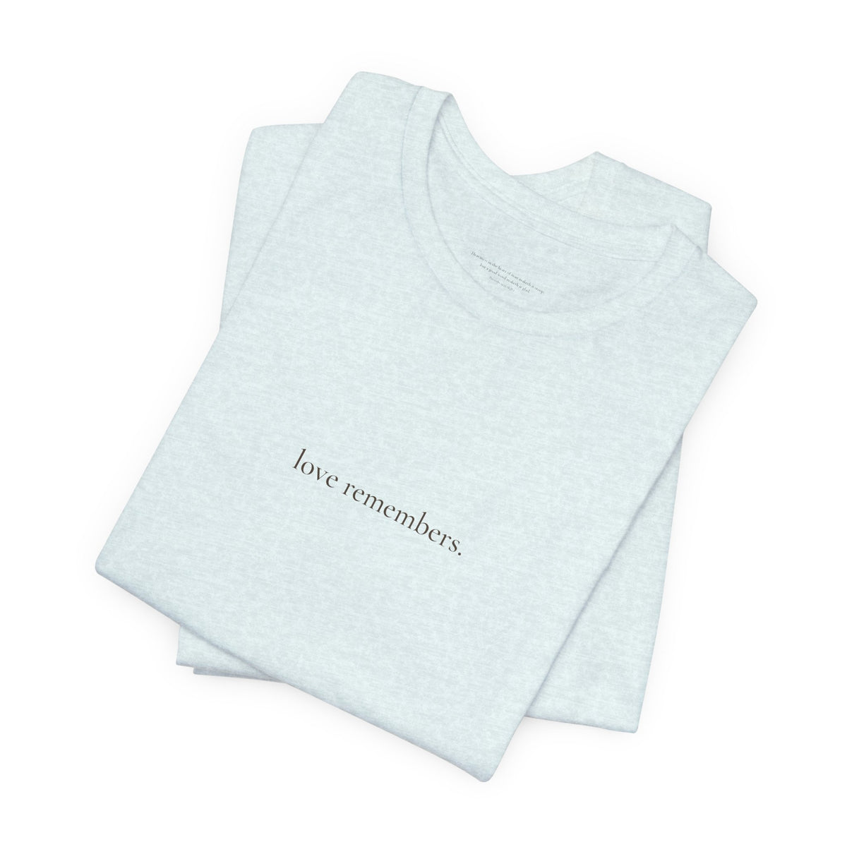 love remembers. tee in Heather Ice Blue, folded