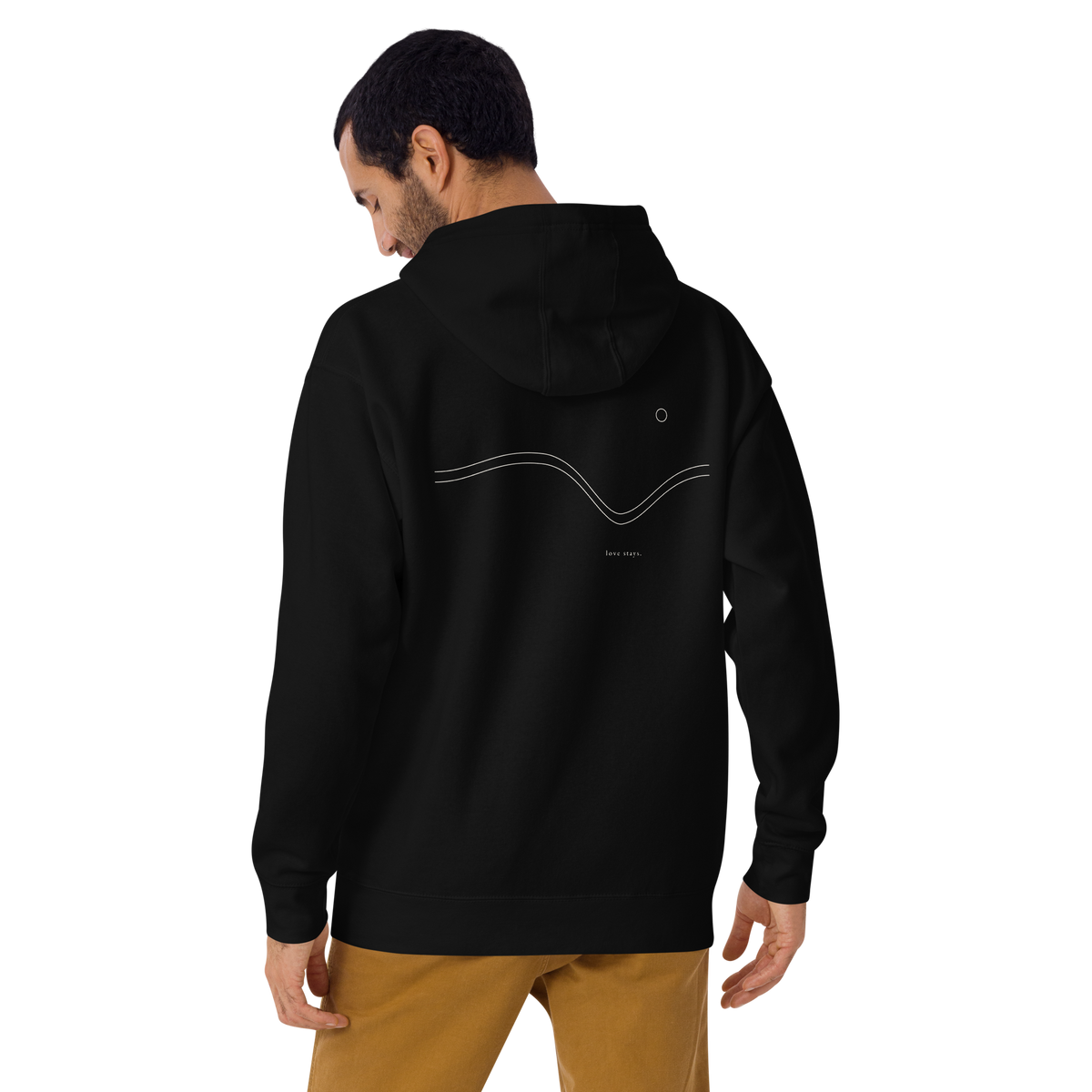Person wearing the black love stays. The Held Line Hoodie, angled back view of the Held Line drawing