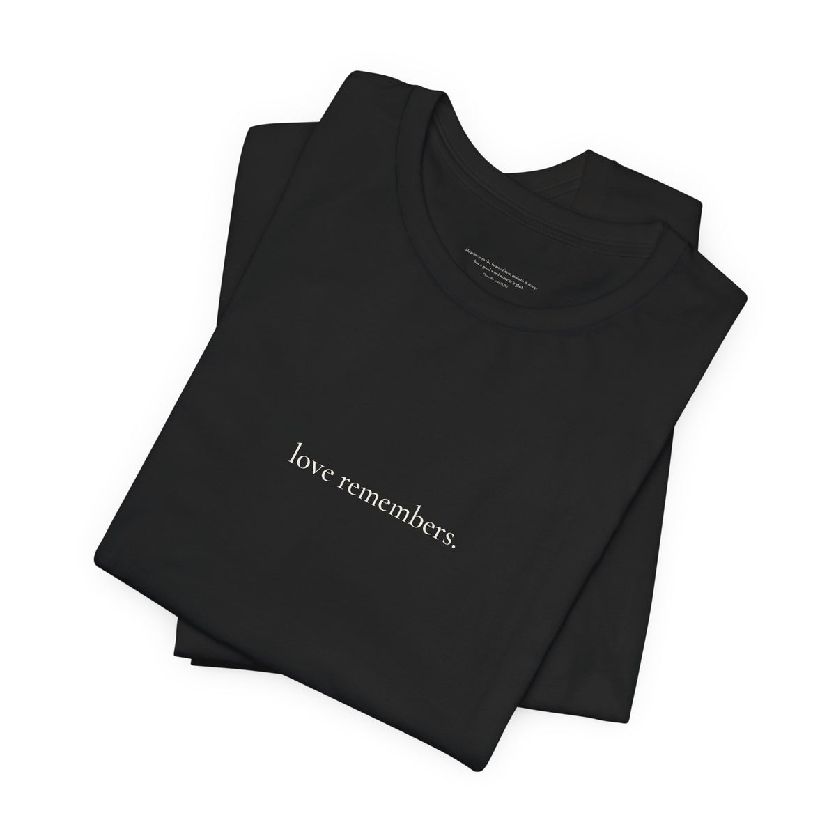 love remembers. tee in Black, folded