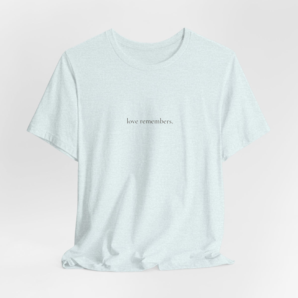love remembers. tee in Heather Ice Blue, on a hanger