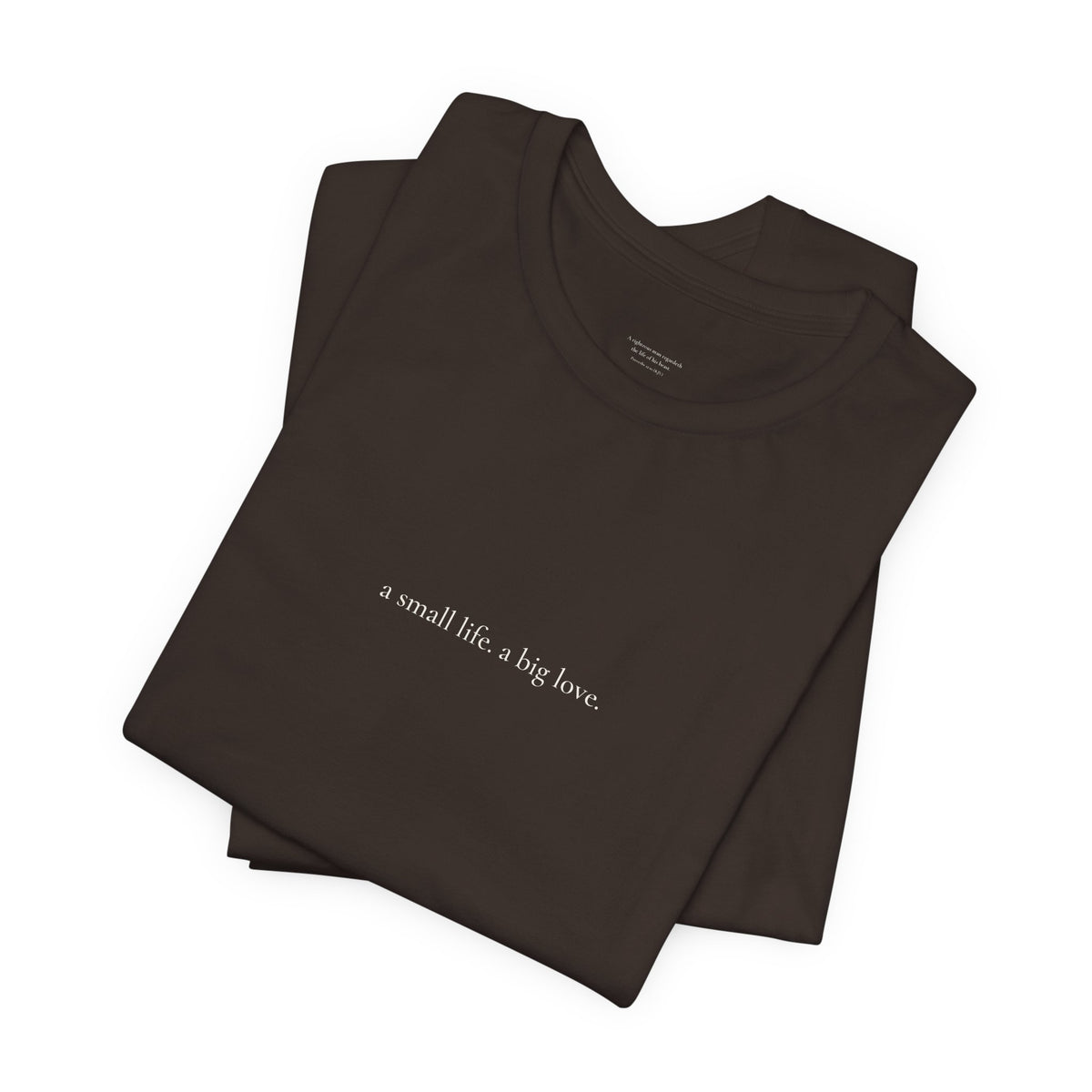 a small life. a big love. tee in Brown, folded