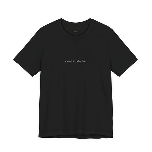 a small life. a big love. tee in Black, front, cream ink