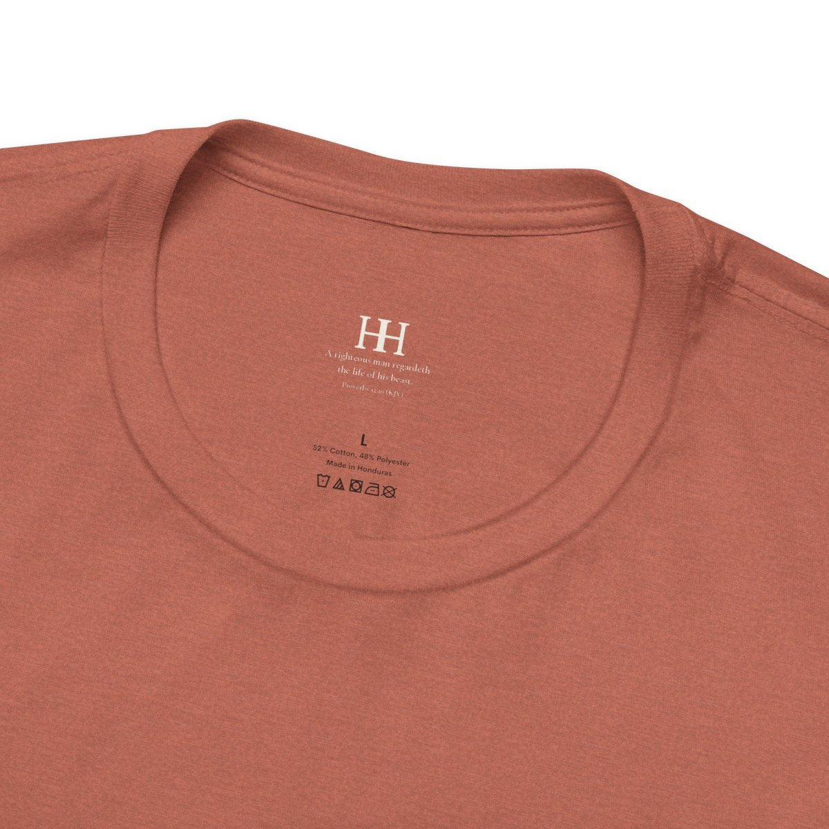 a small life. a big love. tee in Heather Clay, inside collar printed with a small HH mark above Proverbs 12:10