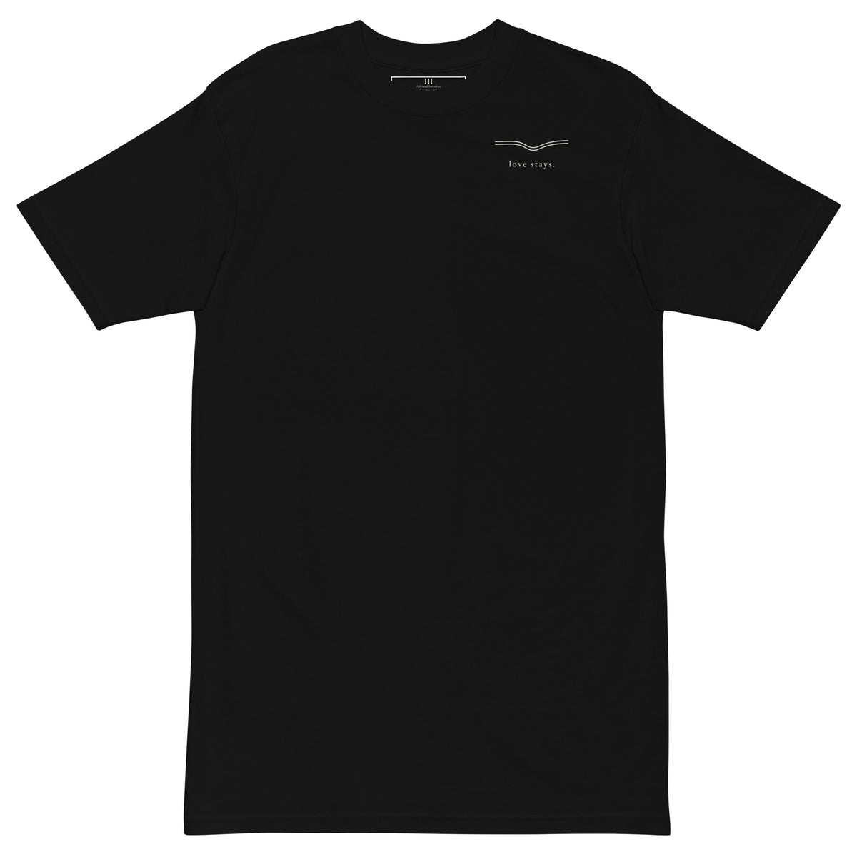 A soft black tee with a small line drawing and the words love stays., one of the apparel choices in the Haven Box.