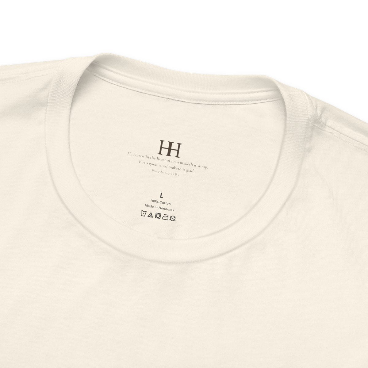 love remembers. tee in Natural, inside collar printed with a small HH mark above Proverbs 12:25